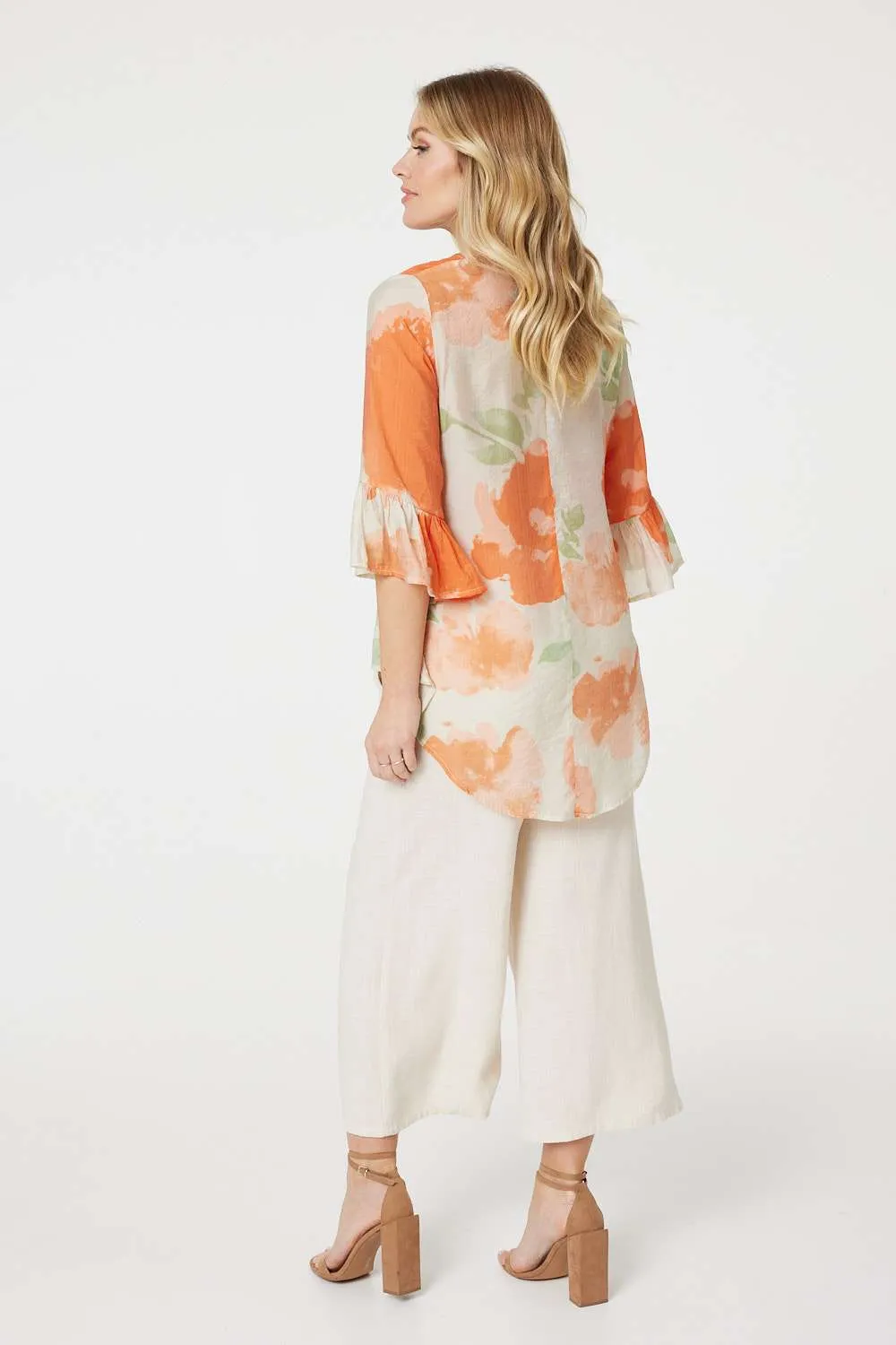 Floral Flute Sleeve High Low Blouse